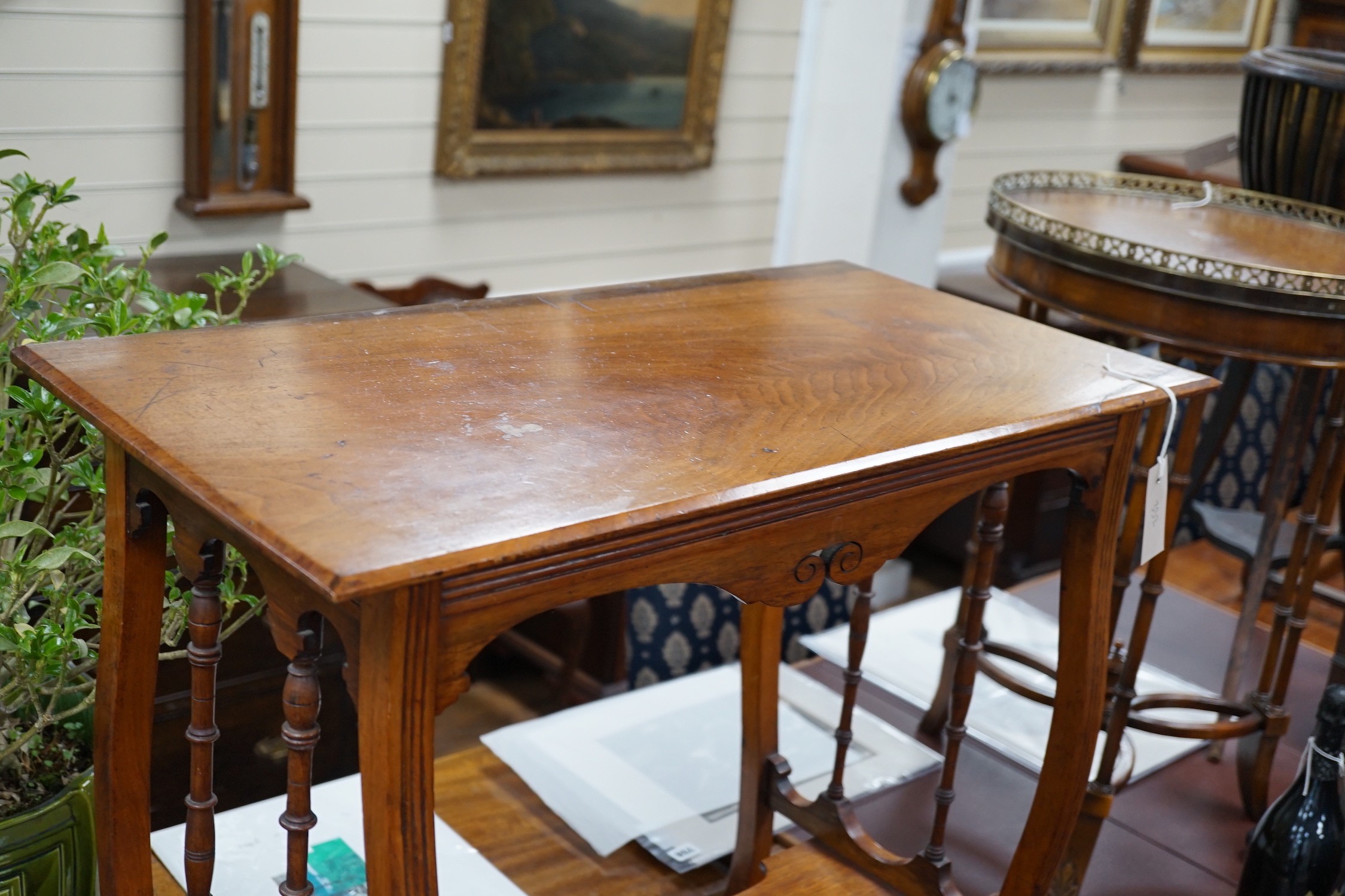 An Edwardian walnut occasional table, width 70cm *Please note the sale commences at 9am.